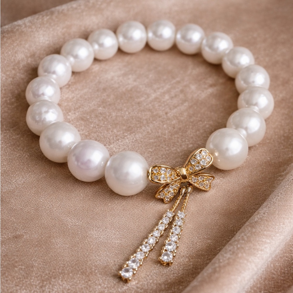 White Freshwater Pearl Bracelet with Bow Charm